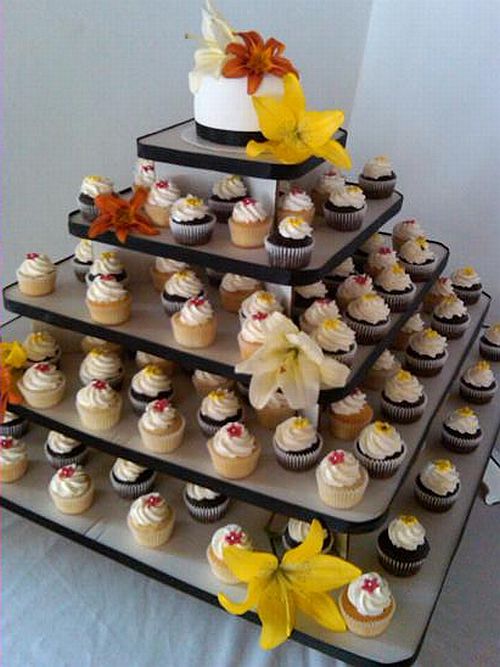 These Cupcakes were dressed with Yellow and Red Flowers with silver dragees
