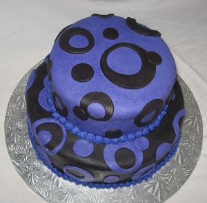 16th Birthday Purple and Black Circle Birthday Cake