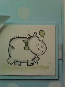 Close up of hippo invitation for baby shower party